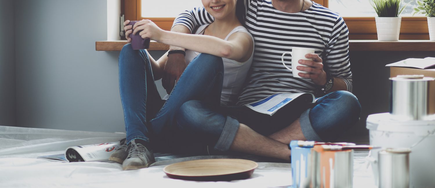 Couple with Paint in Home